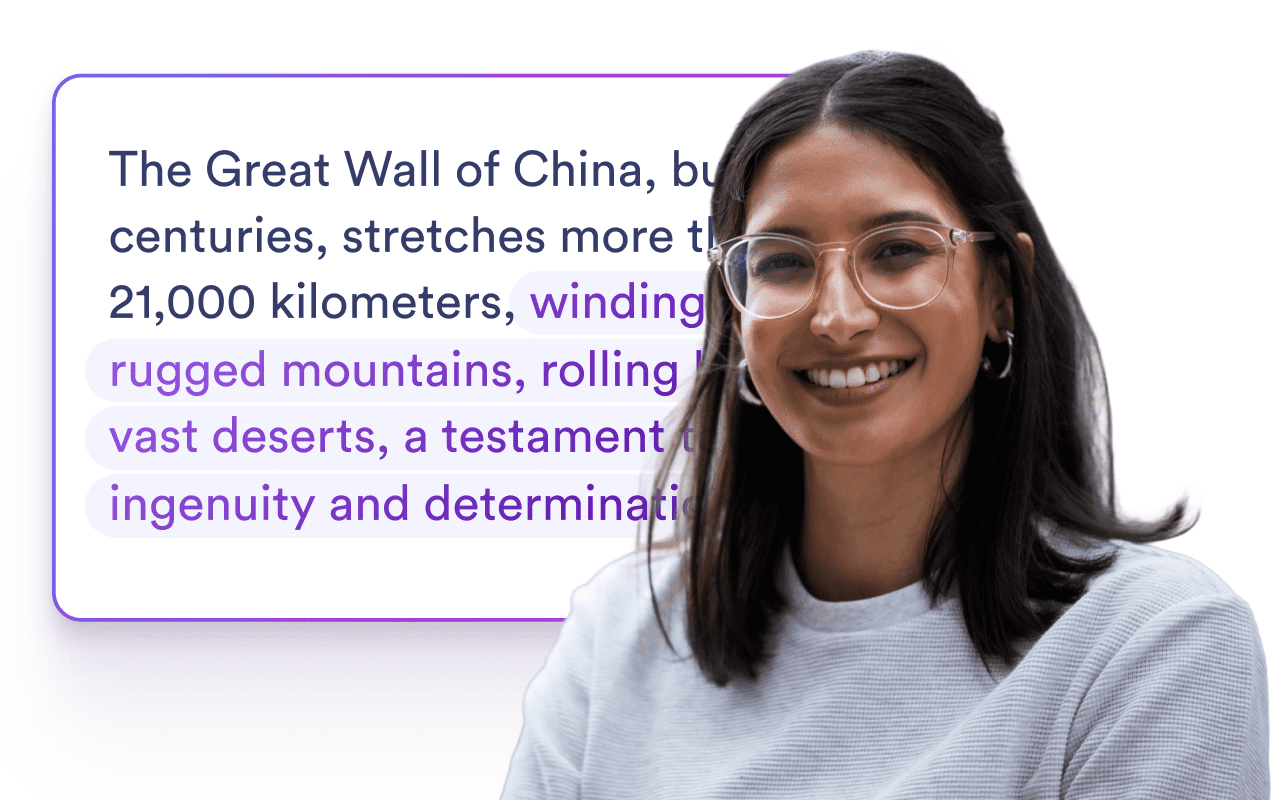 Woman smiling in front of a card about an expanded sentence.