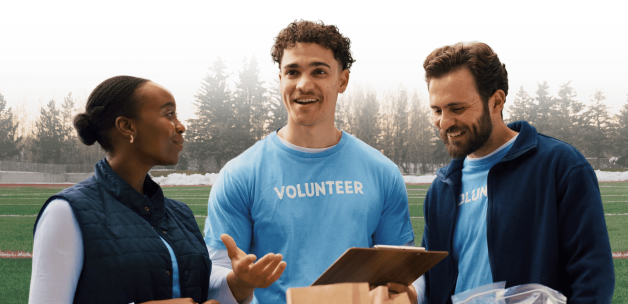 Volunteers coordinating at a sports field